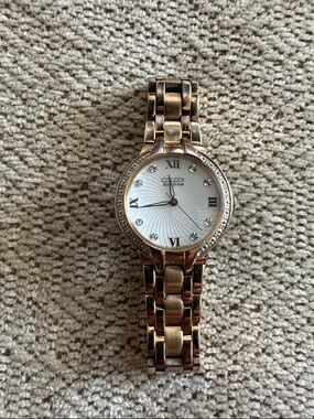 Citizen Bella eco drive stainless steel gold plated watch women’s diamond bezel